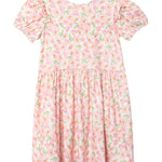 The Wild Savanna Short Gathered Sleeve Dress by Mabel and Honey is a lightweight, knee-length dress with ruffled sleeves, featuring a pink floral print with green leaves on a white background and a gathered waist.