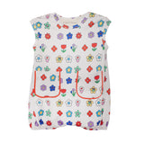 The Mabel and Honey Little Garden Parade Cap Sleeve Romper features playful colorful floral prints, two red-outlined front pockets, a comfy elastic hem, and is perfect for everyday wear.