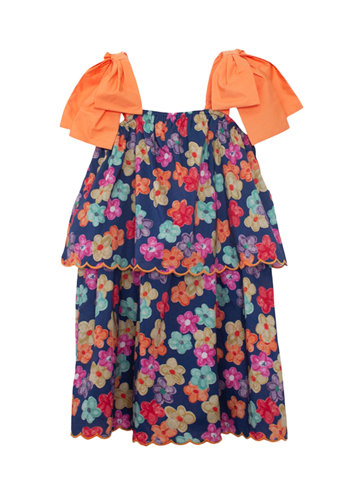 The Fiesta Cap Sleeve Dress by Mabel and Honey features bold orange bow straps, a navy blue base with colorful floral prints, and a scalloped hem. Its tiered, flowy design ensures comfortable wear for any day.