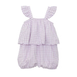 The Mabel and Honey Sugar Plum Sleeveless Romper is a bubble fit romper for baby girls, featuring ruffled straps, an overlay top, and a light lavender gingham pattern with elasticized leg openings for comfort.