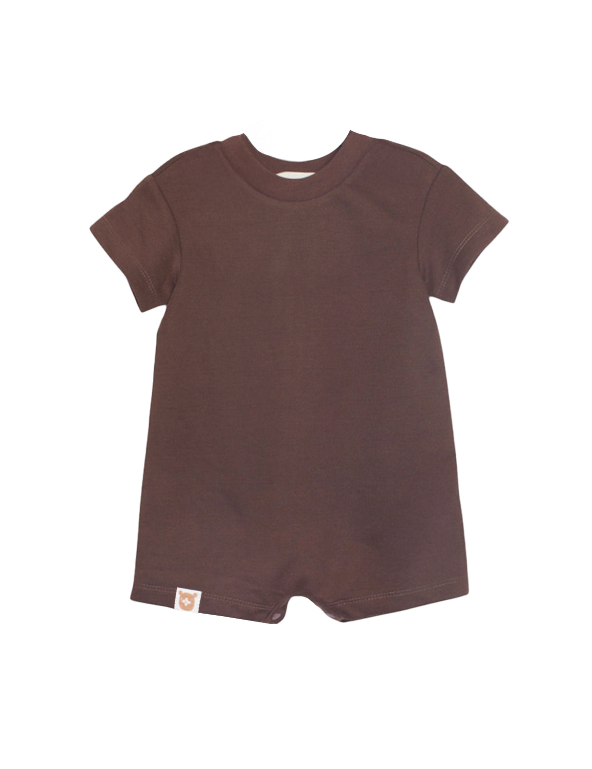 The Nash Short Sleeve Romper by Beckett and Bear is a solid brown baby one-piece with a crew neck, short sleeves, and short legs in soft knit fabric. It features a small tag near the lower left hem and is shown on a white background.