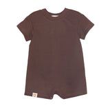 The Nash Short Sleeve Romper by Beckett and Bear is a solid brown baby one-piece with a crew neck, short sleeves, and short legs in soft knit fabric. It features a small tag near the lower left hem and is shown on a white background.