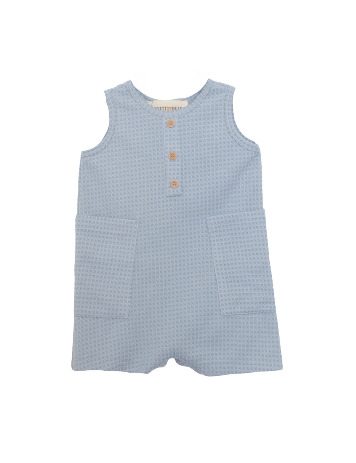 The Rowland Sleeveless Romper by Beckett and Bear features a light blue waffle knit, three wooden buttons, and two large front pockets for toddlers, shown on a white background.