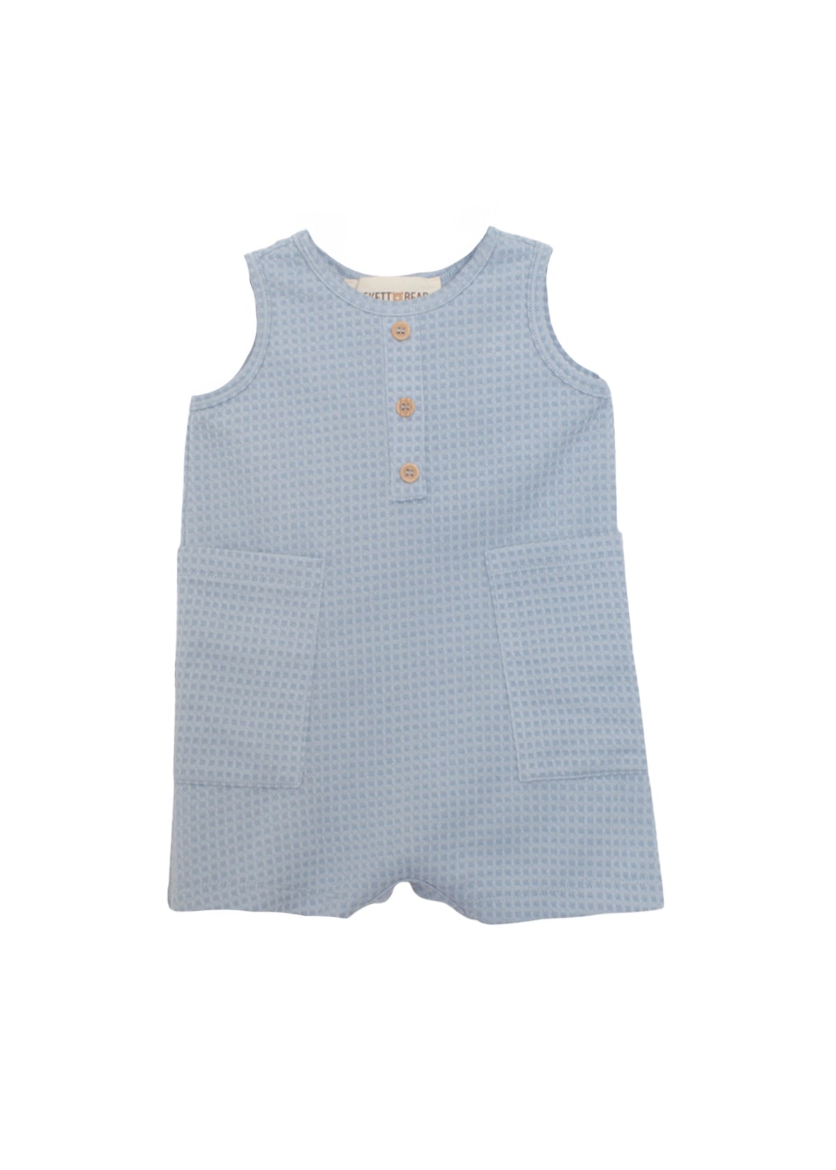 The Rowland Sleeveless Romper by Beckett and Bear features a light blue waffle knit, three wooden buttons, and two large front pockets for toddlers, shown on a white background.