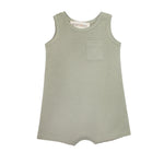 The Beckett and Bear Russell Sleeveless Romper is a light sage green, waffle-knit baby boy romper with a small chest pocket and short legs, shown laid flat on a white background.