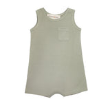 The Beckett and Bear Russell Sleeveless Romper is a light sage green, waffle-knit baby boy romper with a small chest pocket and short legs, shown laid flat on a white background.