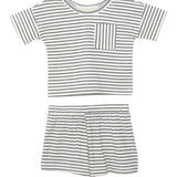 The Micah Short Sleeve Two Piece Set by Beckett and Bear features a white shirt with thin black stripes and a chest pocket, paired with matching striped shorts—perfect for comfy baby outfits.