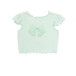 The Isobella and Chloe Alice Short Ruffle Sleeve Top for girls features light mint green ribbed knit, short ruffled sleeves, and a large matching bow on the chest, shown against a plain white background.
