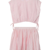 The Mabel and Honey Girlpop Dropshoulder Two Piece Set Pink features a sleeveless, cropped top with side ties and a high-waisted mini skirt in soft, crinkled fabric—an ideal girls pink outfit for any occasion.