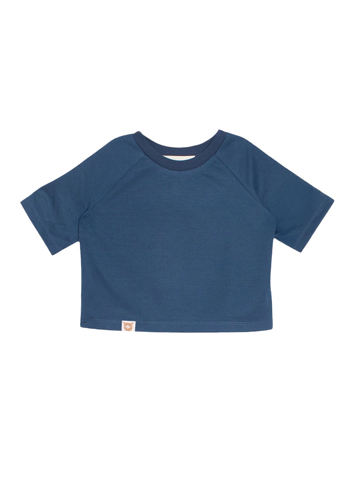 The Beckett and Bear Knox Blue Short Sleeve Top features a round neckline, breathable knit fabric, and a small rectangular logo tag at the hem. The shirt is displayed flat against a white background.