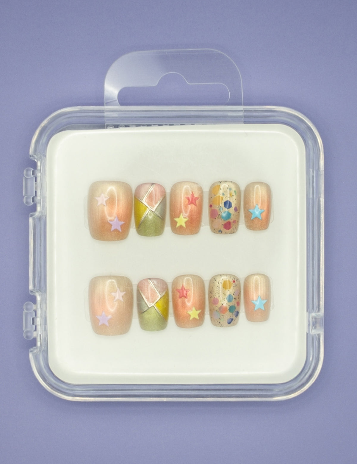 Stars and Sprinkles by Mabel and Honey is a reusable nail set with colorful press-ons, pastel star stickers, geometric patterns, and confetti dots, all in a clear case for a salon-quality manicure.