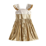 The Isobella and Chloe Metallic Harmony Sleeveless Color Block Ruffle Strap A-Line Dress features ruffled straps, a fitted bodice, and a shimmering gathered skirt in gold and cream tones—making it the perfect metallic dress for any holiday party.