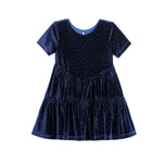 The Mabel + Honey Velvet Dreams Dress is a short-sleeved, knee-length party dress for kids in navy blue velvet, featuring a round neckline, a tiered skirt, and delicate crystal polka dot embellishments throughout the fabric.