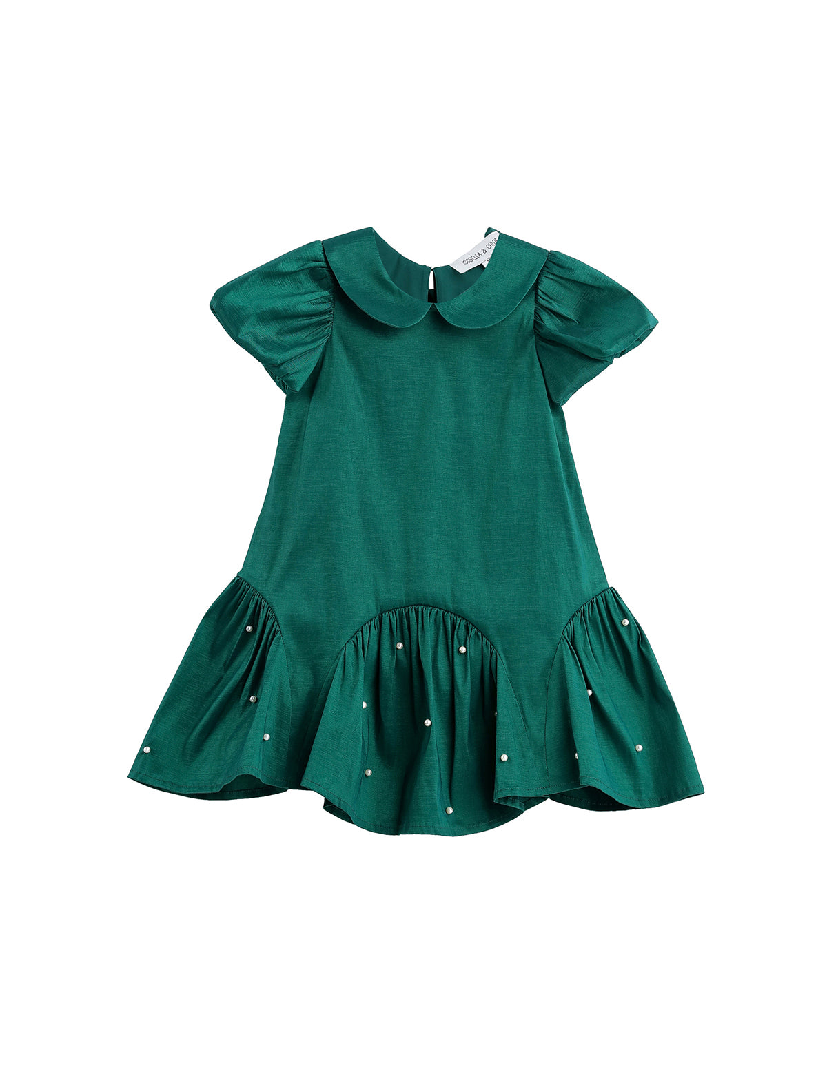 The Holly and Pearls Dress by Mabel + Honey is an emerald green, short-sleeve toddler dress featuring a solid design, Peter Pan collar, drop waist with a flared ruffled hem, and delicate pearl embellishments. The dress is presented against a white background.