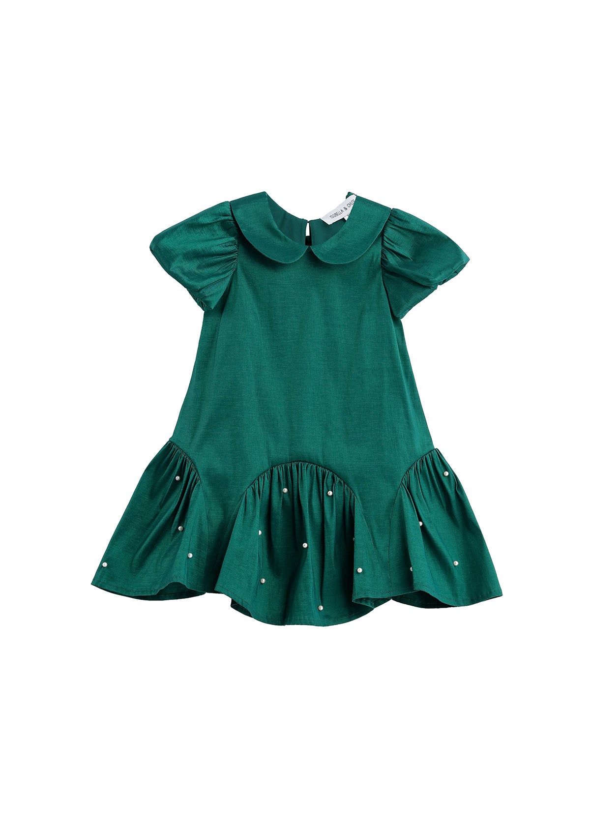 The Holly and Pearls Dress by Mabel + Honey is an emerald green, short-sleeve toddler dress featuring a solid design, Peter Pan collar, drop waist with a flared ruffled hem, and delicate pearl embellishments. The dress is presented against a white background.