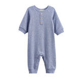The Beckett and Bear Daniel Long Sleeve Solid Ribbed Button Placket Straight Leg Romper is a heathered blue, ribbed knit baby romper featuring long sleeves, three chest buttons, ribbed cuffs, and convenient snap closures at the legs for easy diaper changes—displayed on a white background.