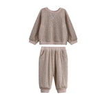 The Beckett and Bear Levi Long Sleeve Solid Ribbed Sweatshirt and Jogger Set is a cozy two-piece heathered taupe outfit for toddlers. Featuring textured ribbed knit fabric, both the sweatshirt and matching jogger pants have ribbed cuffs and are perfect loungewear for fall, displayed here on a white background.