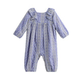 The Mabel + Honey Lavender Lane Romper Long Sleeve Print Ruffle Collar Bubble Romper showcases delicate white embroidered patterns, ruffle details on the shoulders, and gathered cuffs at the wrists and ankles, creating a charming bubble-shaped silhouette that ensures both comfort and style for your little one.