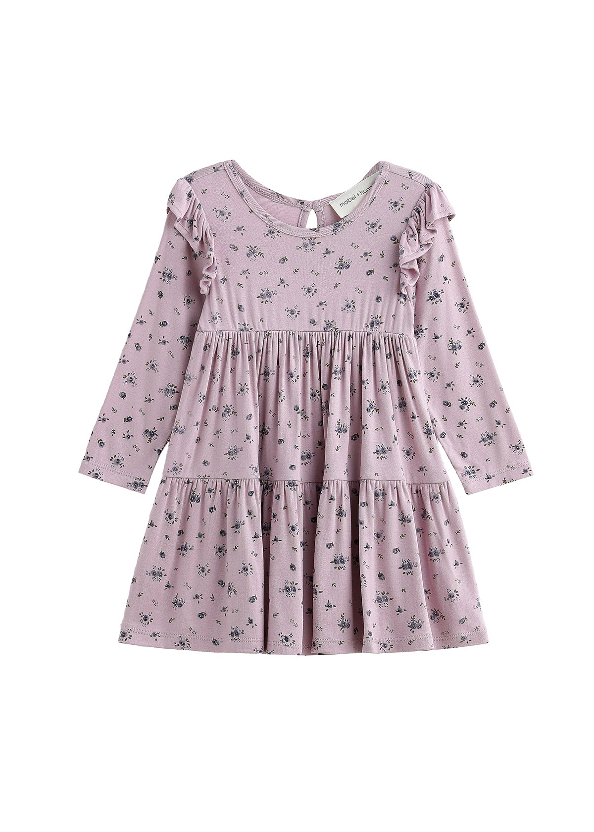 The Victoria Dress Long Sleeve Floral Tiered Ruffle Shoulder Dress by Mabel + Honey is a light purple mauve dress for girls, featuring a small floral print, ruffled shoulder details, and a tiered skirt, displayed on a white background.