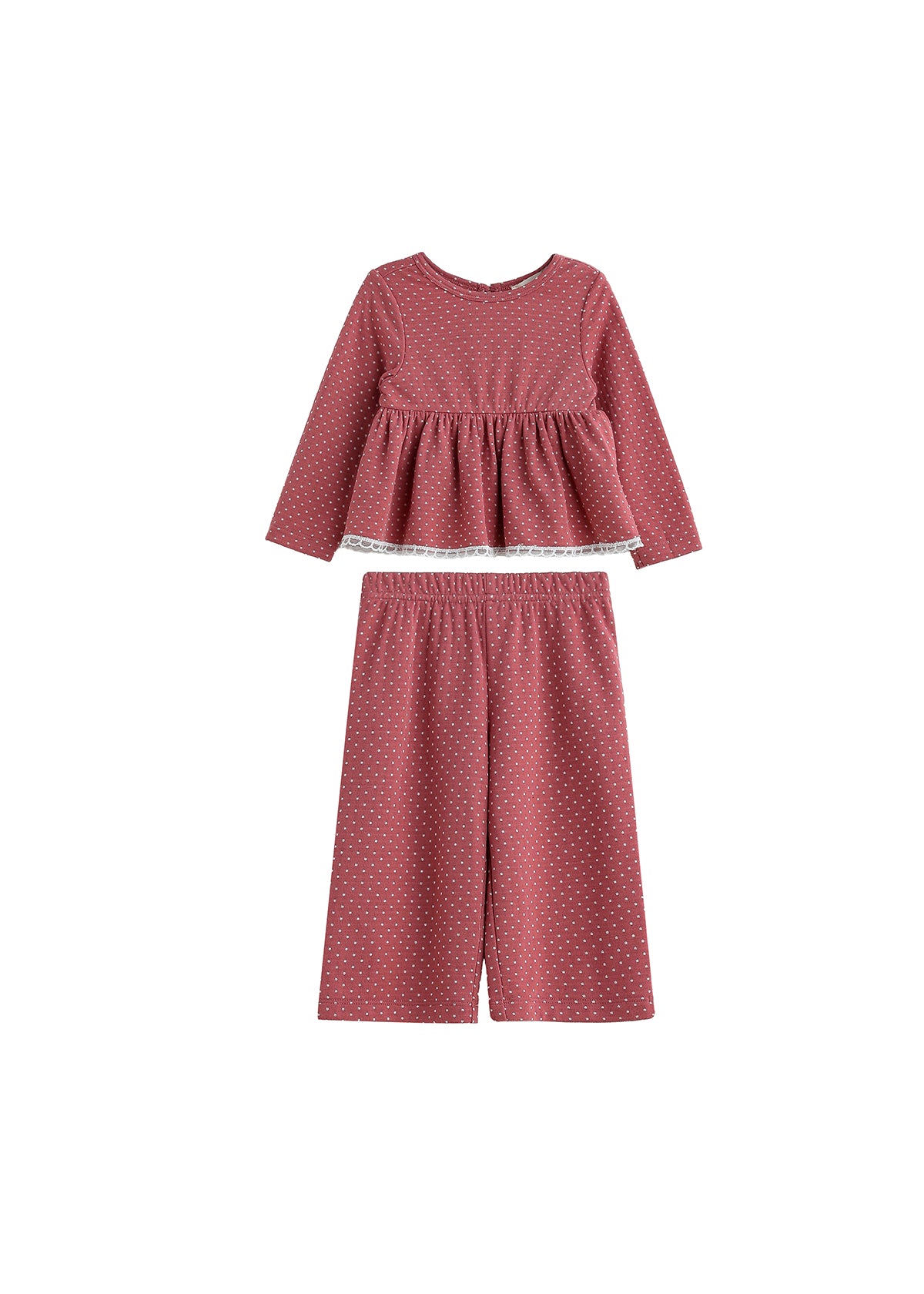 The Maribelle Two Piece Set by Mabel + Honey features a long sleeve polka dot peplum top and matching wide-leg pants in a dusty rose hue with small white spots, creating a playful yet chic look for girls.