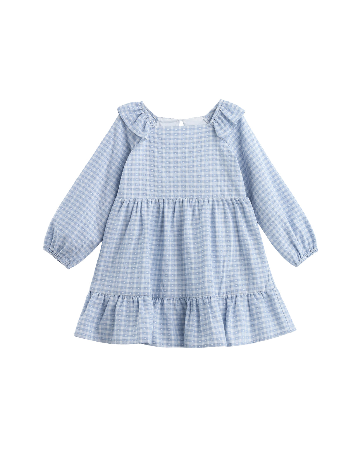 The Ella Rae Dress by Mabel + Honey is a long-sleeve girls’ cotton dress featuring light blue plaid, ruffled shoulders, a charming heart accent, and a tiered, gathered skirt.