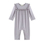 Dress your little one in the Mabel + Honey Maggie Romper Long Sleeve Solid Ruffle Trim Straight Leg Romper. This heathered lavender romper for baby girls features charming ruffle details on the chest and shoulders, and convenient snap buttons along the legs for easy diaper changes. Crafted from soft, comfortable fabric, it’s perfect for your baby’s everyday wear.