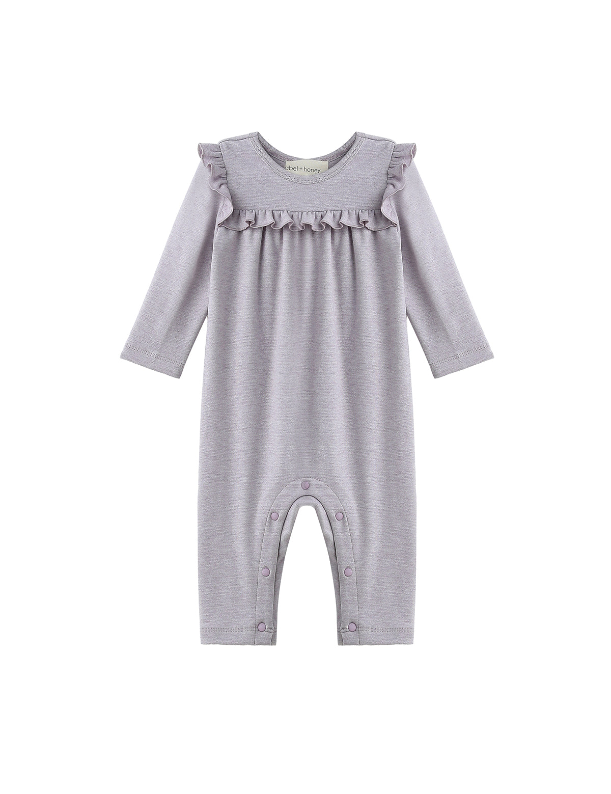 Dress your little one in the Mabel + Honey Maggie Romper Long Sleeve Solid Ruffle Trim Straight Leg Romper. This heathered lavender romper for baby girls features charming ruffle details on the chest and shoulders, and convenient snap buttons along the legs for easy diaper changes. Crafted from soft, comfortable fabric, it’s perfect for your baby’s everyday wear.