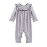 Dress your little one in the Mabel + Honey Maggie Romper Long Sleeve Solid Ruffle Trim Straight Leg Romper. This heathered lavender romper for baby girls features charming ruffle details on the chest and shoulders, and convenient snap buttons along the legs for easy diaper changes. Crafted from soft, comfortable fabric, it’s perfect for your baby’s everyday wear.