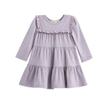 The Mabel + Honey Maggie Dress Long Sleeve Solid Ruffle Tiered Knit Dress in heathered lavender features a round neckline, charming ruffle details across the chest and skirt, and a playful tiered silhouette—perfect for coordinating sibling outfits.
