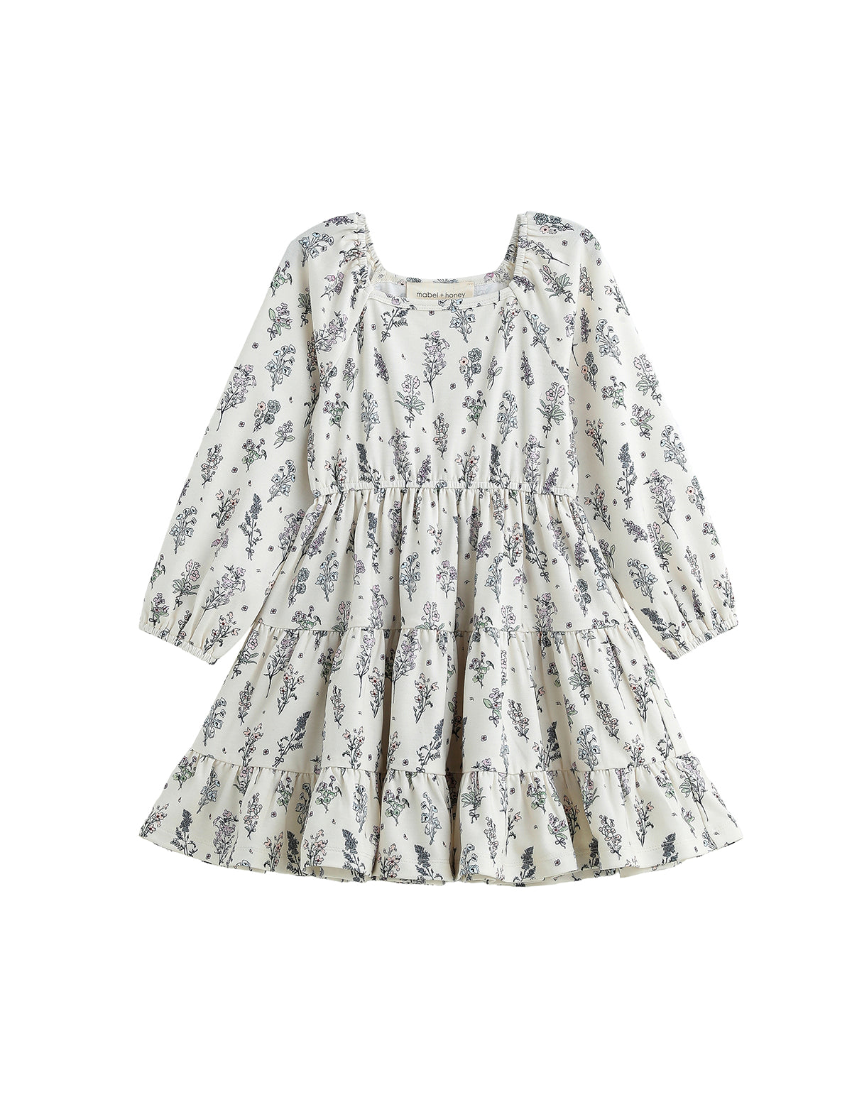 The Gracie Dress Long Sleeve Floral Print Tiered A Line Dress by Mabel + Honey features a white, long-sleeve design with blue wildflower prints, a tiered skirt, square neckline, and a flowy A-line silhouette for girls.