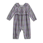 Introducing the Mabel + Honey Char Romper Long Sleeve Plaid Ruffle Trim Romper: this adorable baby romper features charming ruffle accents and long sleeves, designed in a soft lavender flannel plaid with shades of purple, gray, and white. Convenient snaps along the inner legs make for easy changing.