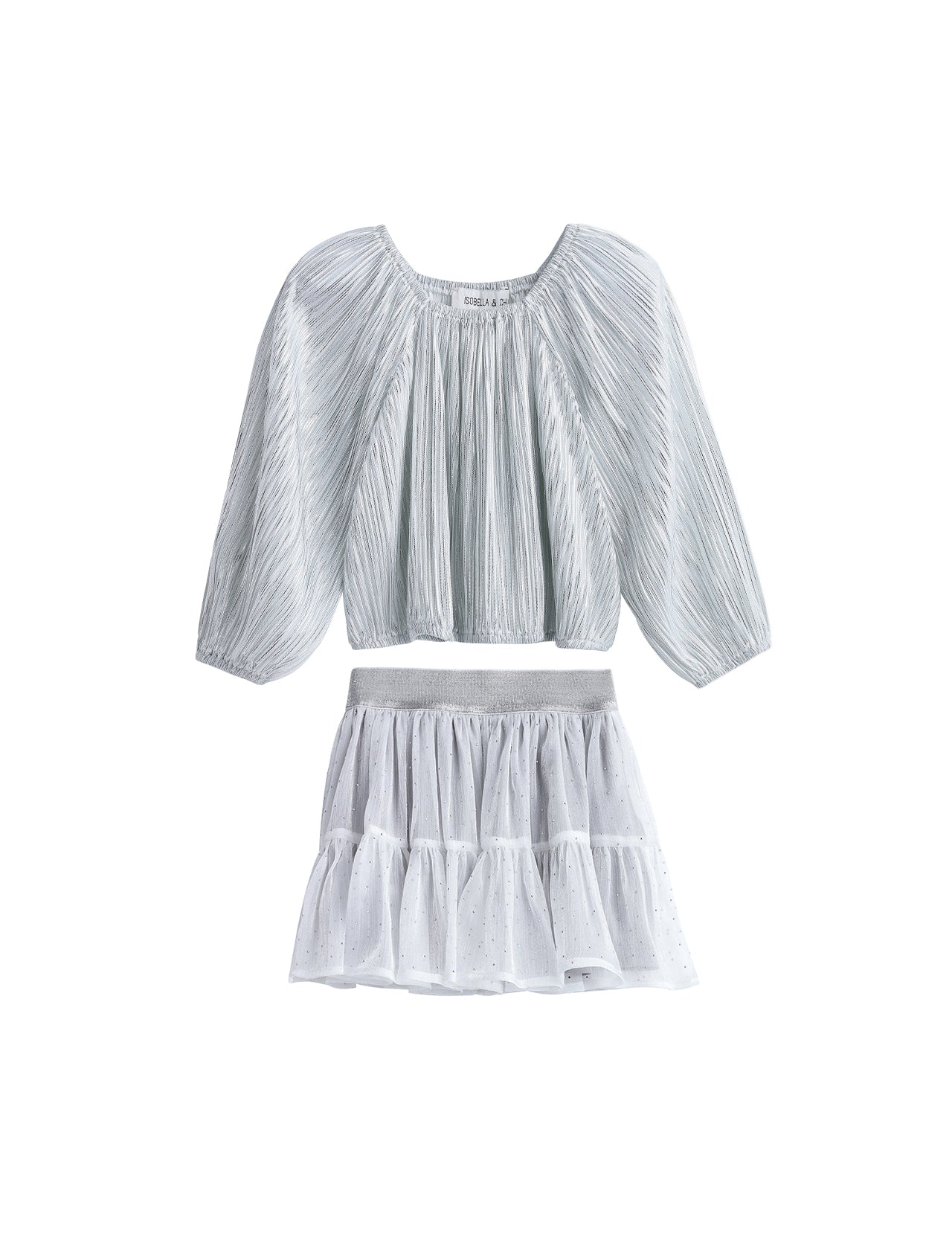 The Shimmer Shine Two Piece Set from Mabel + Honey features a light gray, metallic long sleeve solid top with elegant pleats and a gathered neckline, paired with a white sparkle dot tulle skirt detailed with subtle dots, tiered layers, and a wide waistband—an effortlessly chic ensemble perfect for any occasion.