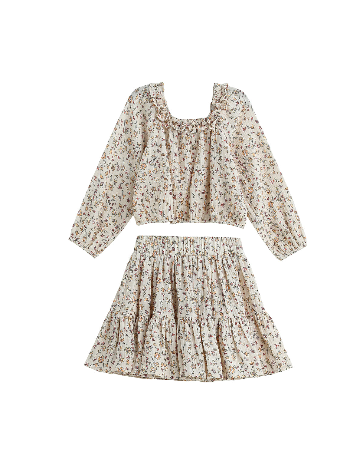 The Autumn Breeze Two Piece Set Long Sleeve Floral Top And Skirt from Mabel + Honey features a delicate, light floral print. The set includes a long-sleeve, ruffled crop top with a square neckline, perfectly matched with a high-waisted, tiered skirt. Both pieces are crafted from lightweight fabric for effortless elegance.