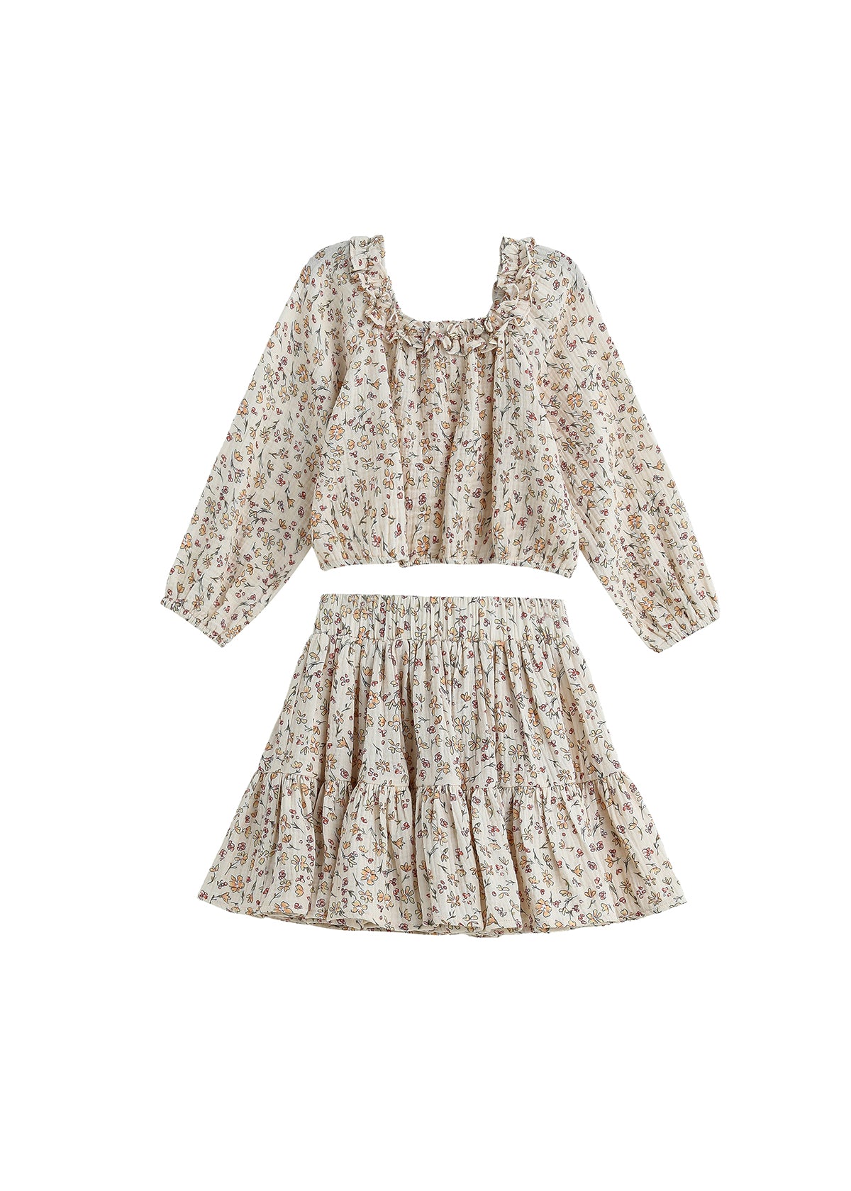 The Autumn Breeze Two Piece Set Long Sleeve Floral Top And Skirt from Mabel + Honey features a delicate, light floral print. The set includes a long-sleeve, ruffled crop top with a square neckline, perfectly matched with a high-waisted, tiered skirt. Both pieces are crafted from lightweight fabric for effortless elegance.