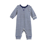 The Benjamin Long Sleeve Striped Straight Leg Romper from Beckett and Bear is a baby romper crafted from soft ribbed cotton, designed in navy blue and white horizontal stripes. It features a round neckline and convenient snap closures at the legs.