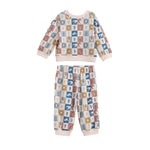 Introducing the Beckett and Bear Westin Long Sleeve Western Print Sweatshirt and Jogger Set: a two-piece children’s loungewear set crafted from soft cotton knit for ultimate comfort. This cozy ensemble features a pastel-colored checkerboard print adorned with charming animal and nature icons on each square, paired with light pink cuffs and collar for a sweet, playful touch.