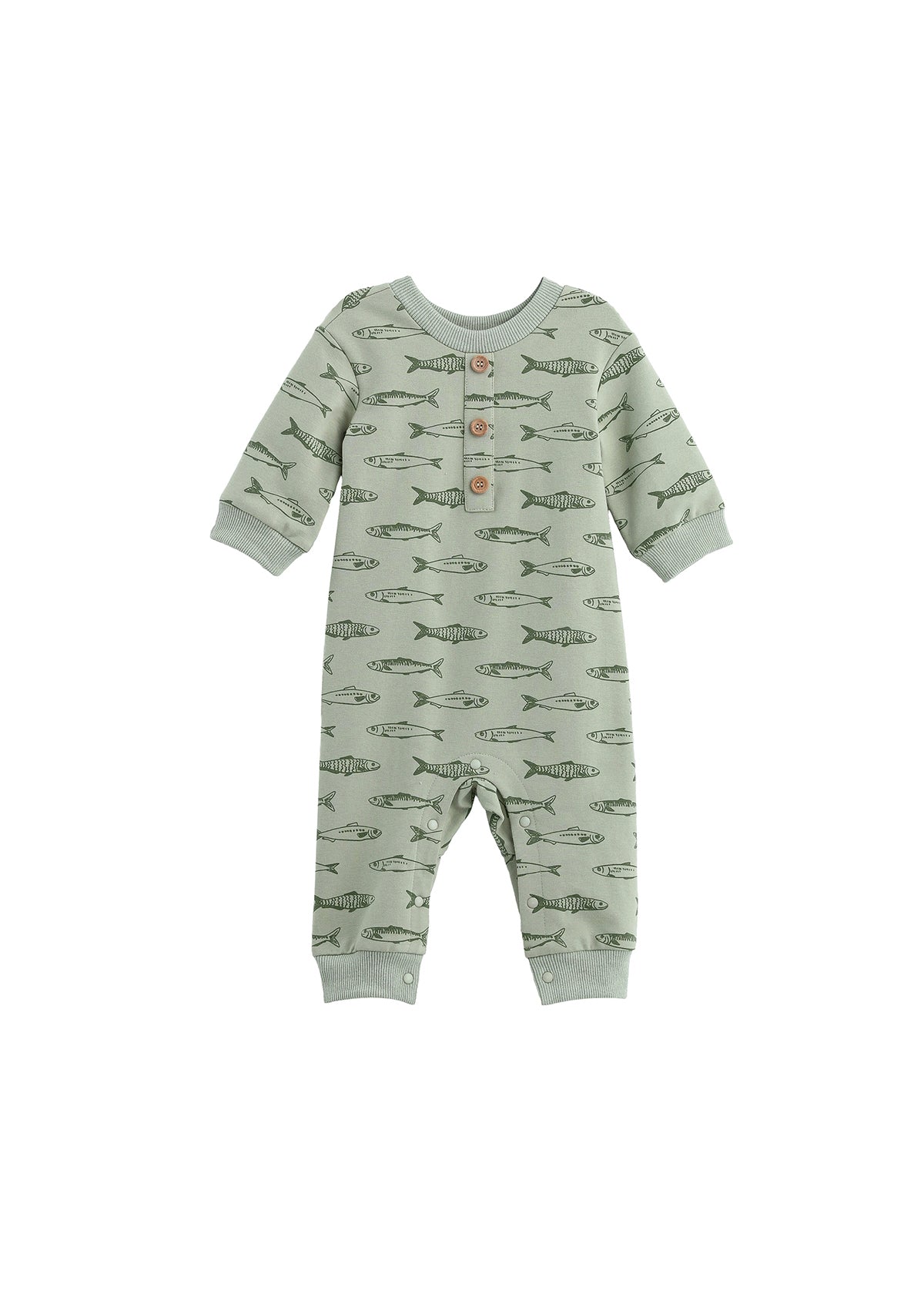 The Matthew Romper Long Sleeve Fish Print Straight Leg Romper by Mabel + Honey is a sage green baby romper featuring long sleeves, a charming hand-drawn fish print, and wooden buttons on the chest. Designed for comfort and convenience, it includes cuffed sleeves and ankles as well as snap closures for easy changing.