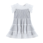 The Mabel + Honey Shimmer Shine Dress Flutter Sleeve Polka Dot Tiered Party Dress features white and light gray hues, short sleeves with sheer, dotted fabric, and ruffled layers on the skirt—an ideal holiday dress for special occasions. Displayed on a white background.