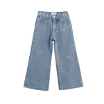 Mabel + Honey Pants Wide Leg Denim Bow Print Rhinestone Embellished Pants for kids in light blue, showcasing small embroidered bows with dotted details and delicate rhinestone accents, displayed on a white background.