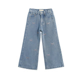 Mabel + Honey Pants Wide Leg Denim Bow Print Rhinestone Embellished Pants for kids in light blue, showcasing small embroidered bows with dotted details and delicate rhinestone accents, displayed on a white background.