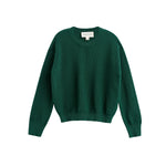 Showcased on a white background, the Mabel + Honey Evergreen Sweater Long Sleeve Solid Ribbed Crewneck Sweater features a plain dark green color, ribbed-knit texture, cozy long sleeves, and a classic crew neckline—making it a timeless wardrobe staple.