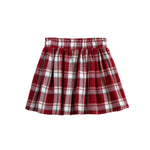 Introducing the Mabel + Honey Winterberry Skirt—a plaid pleated A-line skirt crafted from cozy flannel. Featuring an elastic waistband for comfort, this skirt boasts a classic red base with white, black, and green checkered lines. The schoolgirl-inspired design makes it an ideal winter option for girls seeking timeless style and everyday ease.