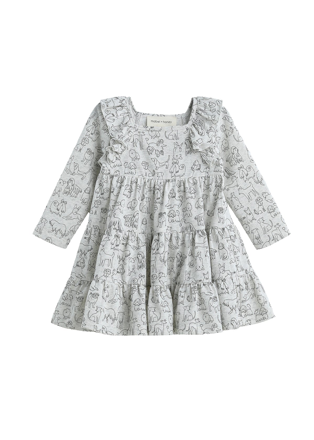 The Mabel + Honey Doggie Doodles Dress Long Sleeve Print Tiered Dress features a light gray fabric adorned with a charming black outline dog print. Designed with playful ruffles on the shoulders and a tiered skirt, this girls’ fall dress is perfect for little animal lovers.