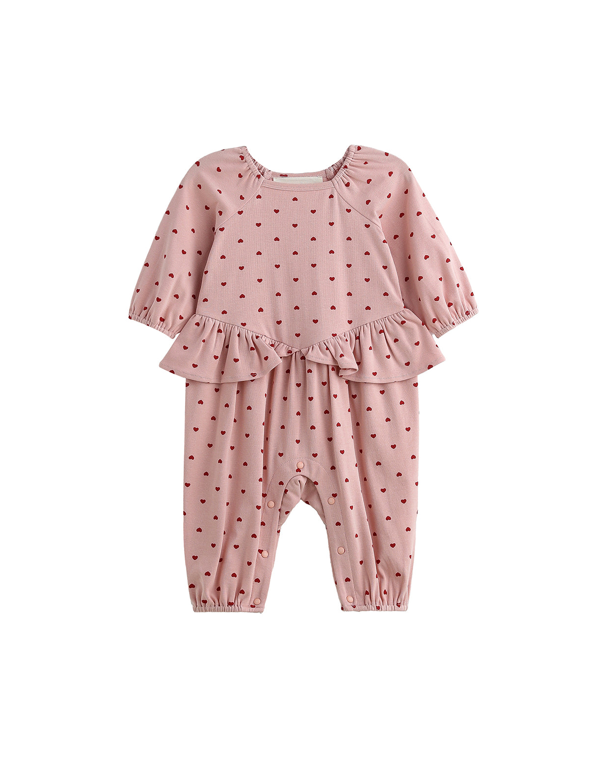 Dress your little one in the Mabel + Honey Love me Lots Romper Long Sleeve Heart Print Ruffle Waist Romper—featuring a playful pink design with red heart prints, ruffle details at the waist, and elastic cuffs at the wrists and ankles. This adorable piece is perfect for girls as a Valentine’s Day outfit!.