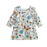 Introducing the Autumn Blooms Long Sleeve Floral Ruffle Trim Empire Waist Dress by Mabel and Honey. Featuring long sleeves, a ruffled neckline, and an empire waist, this charming knee-length dress showcases a lovely floral print in blue, orange, and beige on a white background. Perfect for special occasions or everyday wear.