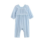 Dress your little one in the Luna Bella Romper Long Sleeve Star Print Ruffle Trim Romper by Mabel + Honey—a light blue romper featuring long sleeves, delicate dark blue star prints, ruffled chest detail, and elastic cuffs at the sleeves and ankles.