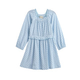 The Luna Bella Dress Long Sleeve Print Fit And Flare Dress by Mabel + Honey features a light blue color with small dark blue polka dots, a gathered neckline and waist, and charming ruffle detailing across the chest—perfect for matching sibling outfits.