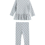 The Mabel + Honey Petite Petal Two Piece Set features a long-sleeved floral peplum top and matching ribbed knit leggings, both in light blue with a delicate red floral print and ruffled trim. This charming set is displayed on a white background.