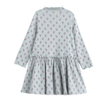 Mabel and Honey Petite Petal Long Sleeve Floral Ruffle Trim Dropwaist Dress in a light blue ribbed knit, featuring a ruffled mock neckline, long sleeves, and a drop-waist gathered skirt.