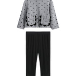 The Mabel + Honey Petal Pockets Two Piece Set features a long sleeve floral top with scalloped pockets and plain black pants, arranged flat on a white background.